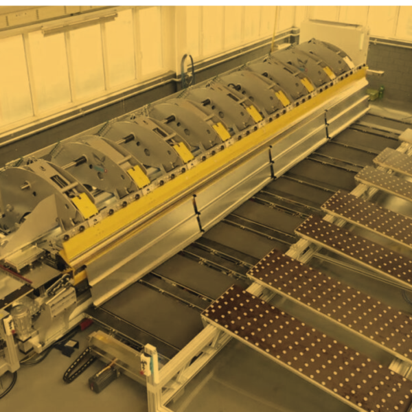 Thalmann TD machine with automation, displayed on a sleek white background, highlighting its advanced design and precision engineering for efficient metal folding.